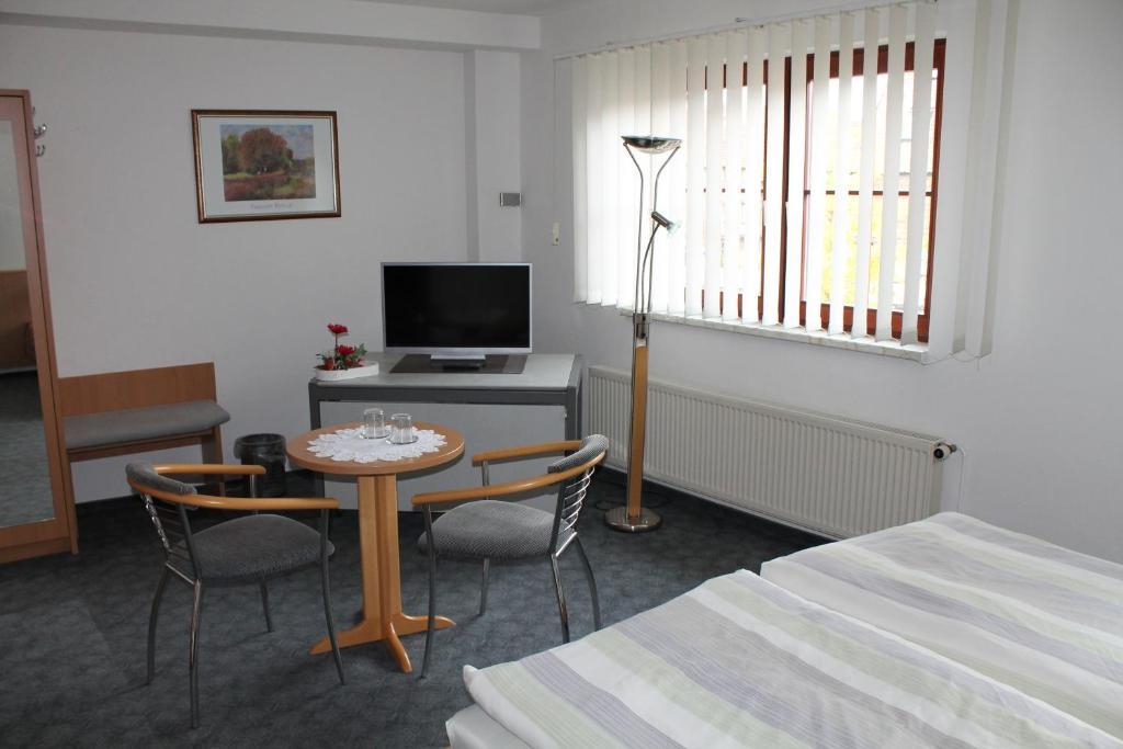 Hotel Am Stadtwall Кведлинбург Стая снимка